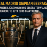 alt_text: Jose Mourinho tersenyum lebar di Bernabeu, menandakan potensi reuni menggugah di Madrid.