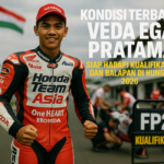 alt_text: Veda Ega mengalami kecelakaan saat sesi latihan FP2 di Hungaria, kondisi terkini stabil.