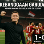 alt_text: John Herdman tampak puas setelah kemenangan Kanada melawan Oman.